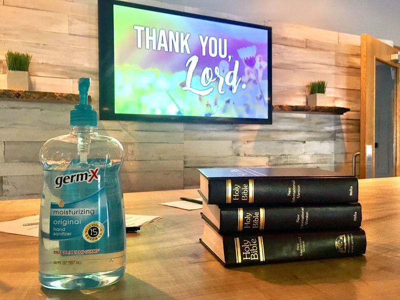 Together safely in the house of God: Congregation, distanced by virus, gathers again bibles